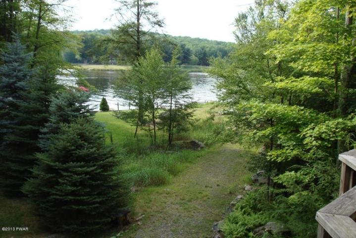 Lakefront CHALET Getaway in THE HIDEOUT!!! Absolutely Gorgeous Views, Has ALL The Extras Including Deck & Detached Garage!