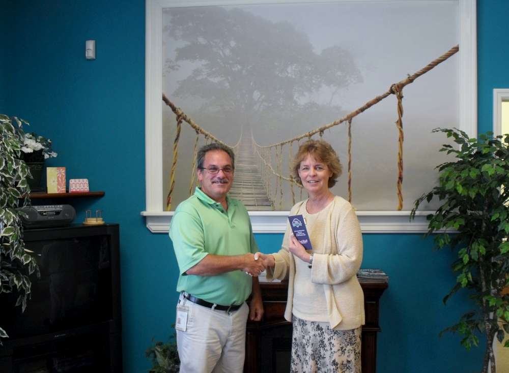Judy Rothermel Presenting Robb Murray Phillies Tickets from The Taste of Medford Raffle